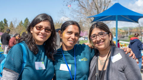 three parent leaders smiling